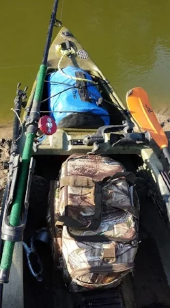 Tent, camping gear, and food ready to go.