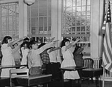 American School Children Saluting the American flag (est. 1940 - WikiCommons)