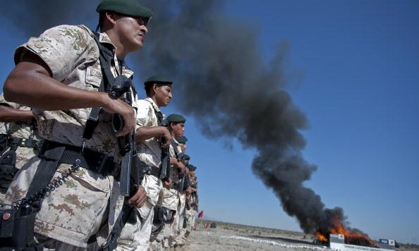 Mexican soldiers burning marijuana, cocaine, heroin and other drugs in Ciudad Juarez, Chihuahua. Photograph: AFP/Getty