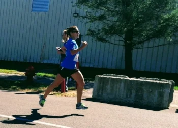 Theresa Loomis racing in the YMCA 10 miler in May 2016.