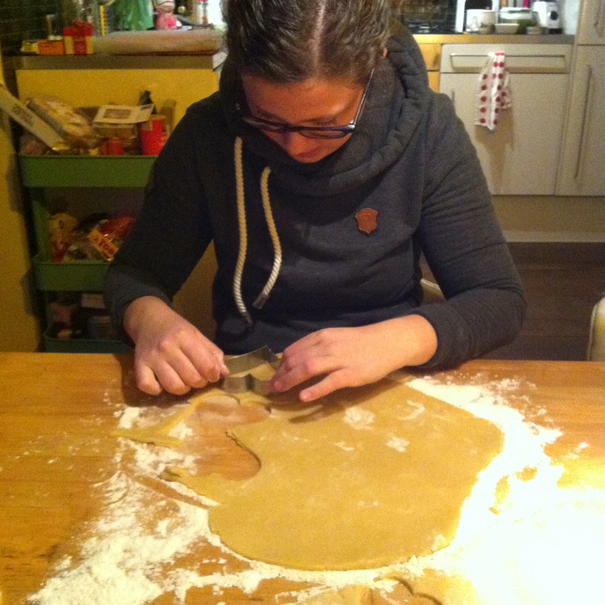 Working her magic with the cookie cutters!