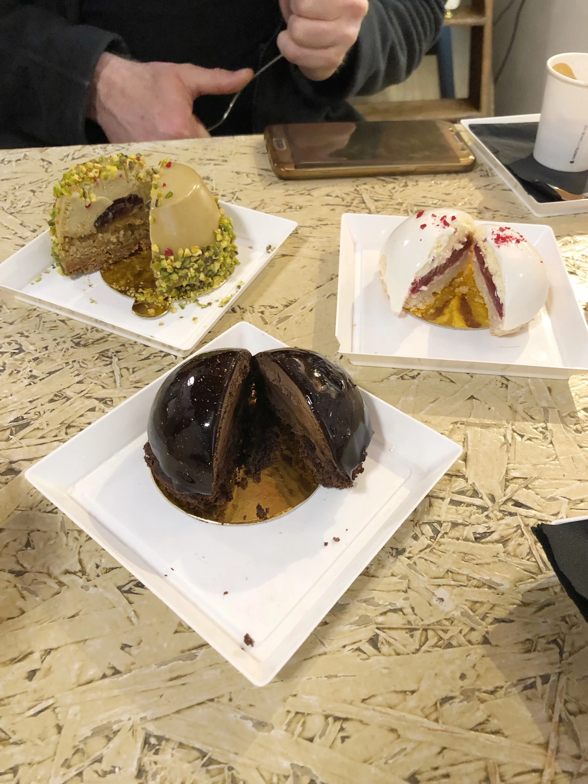 Chocolate domes and pistachio panna cotta.