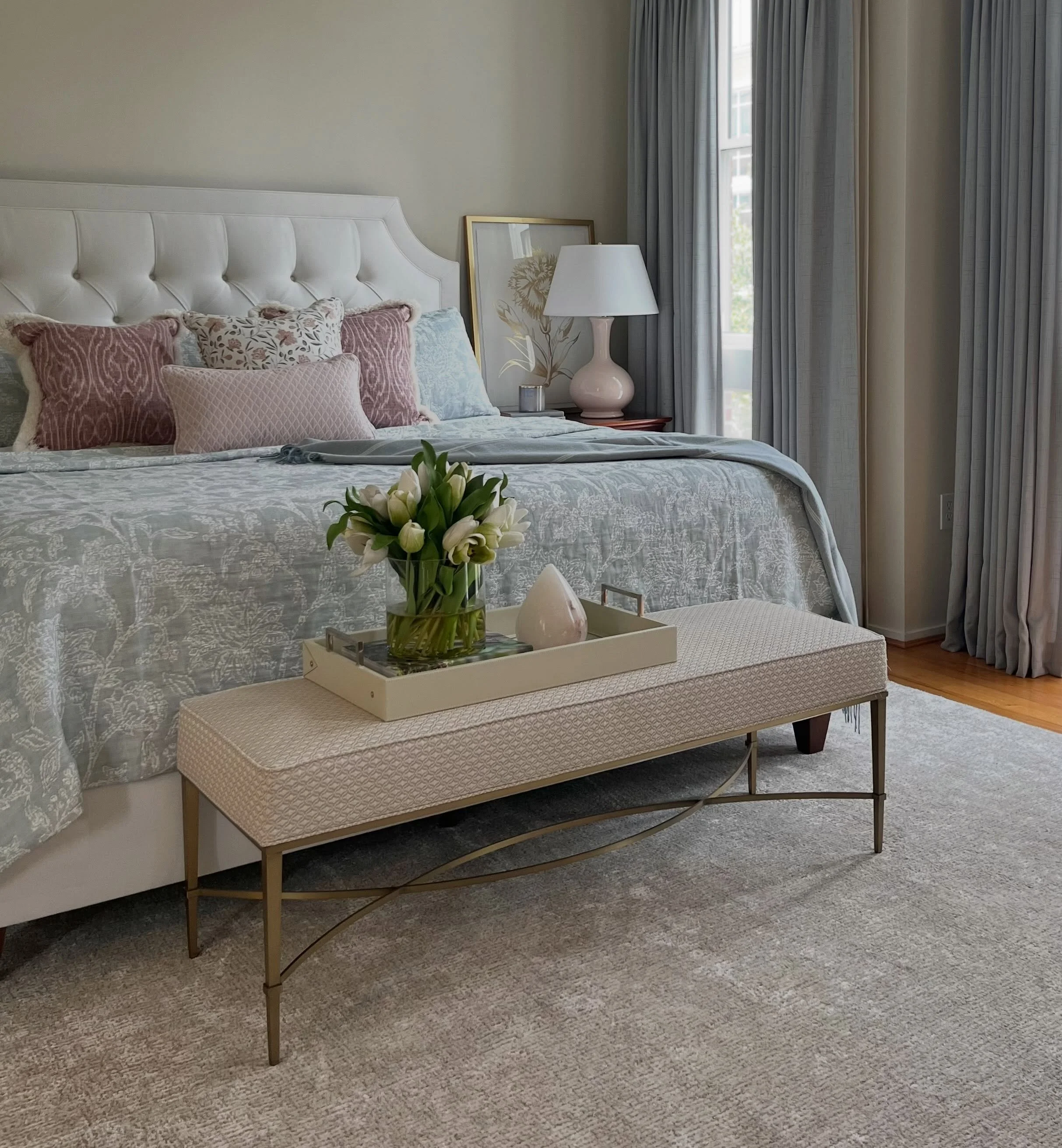 Sometimes the right paint color changes everything. We kept the existing drapery, but softened the walls so their true beauty could finally shine, then layered in new furniture and details to bring the whole room together. One of the greatest gifts o