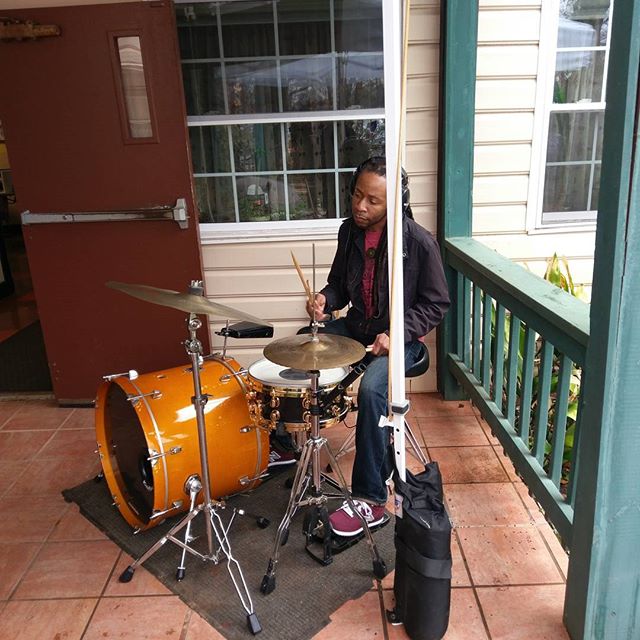 Greg the drum teacher providing music.