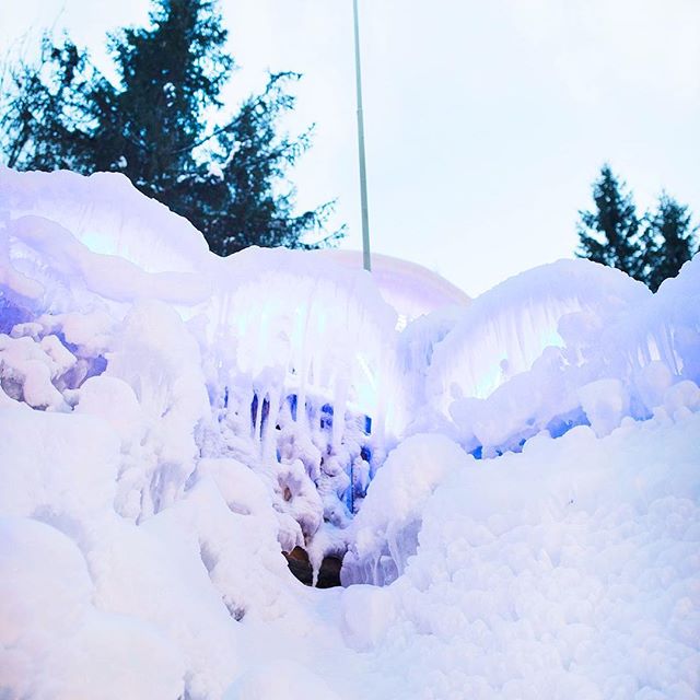 With just a few minutes until dusk, a few colored lights flicker on and accent the towers of the ice palace.