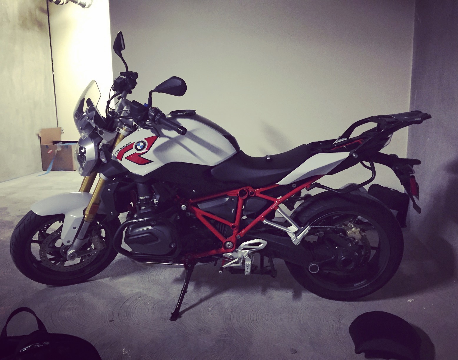 This 2015 BMW R1200R had a stock seat height of 30" and nothing lowered. 