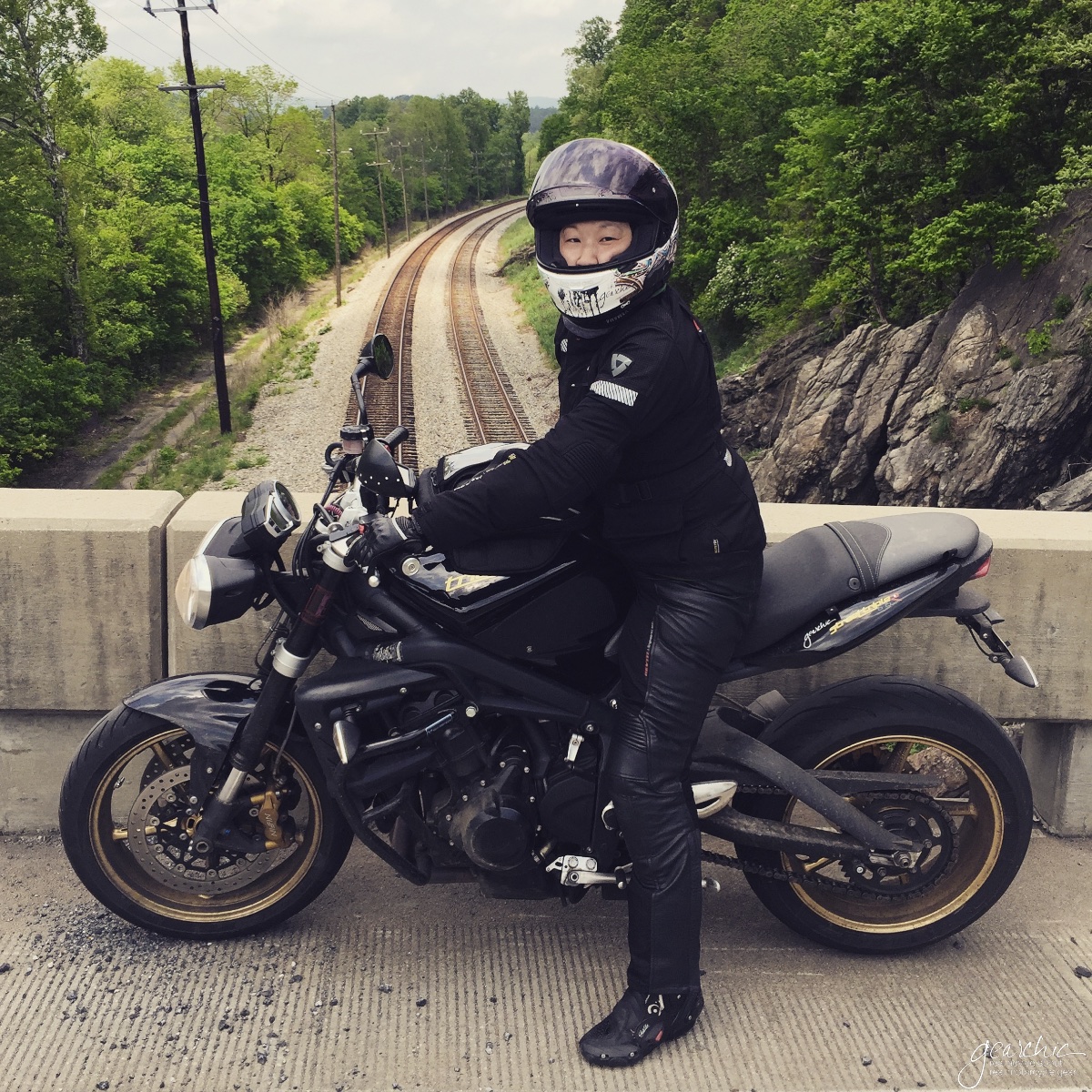 Me on my 2012 Street Triple R with a custom Ohlins Rear Shock