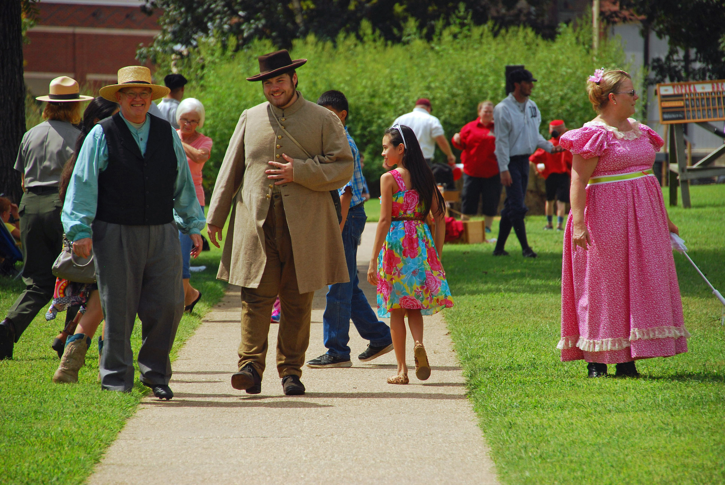  The umpire and the manager of the Westerns share a stroll. 