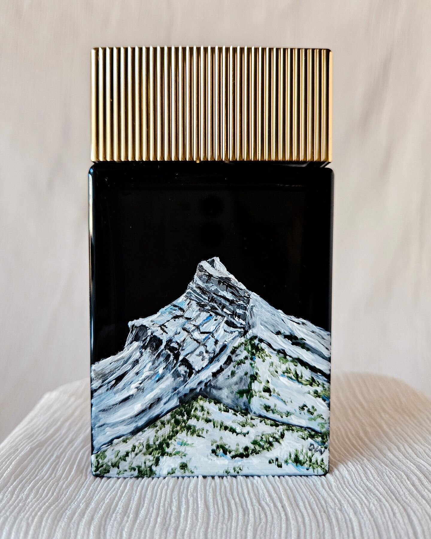 An example of how a perfume or cologne bottle can be tailored for your wedding. This was a gift for the groom, and the bride asked to engrave his name + wedding date on the front. She asked if I could paint Mount Rundle on the back since you can see 