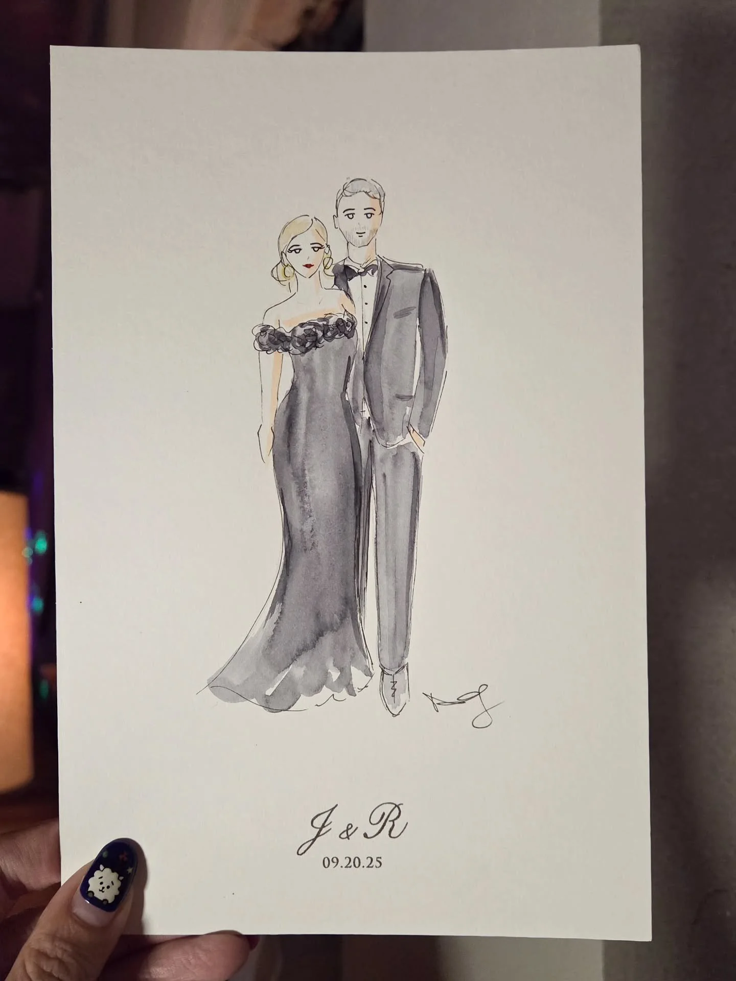 An intimate wedding where guests took home a personalized fashion illustration of themselves. Everyone was so chic in all black outfits, and they were able to recognize themselves easily when picking it up. It's the little things like hairstyles, gla