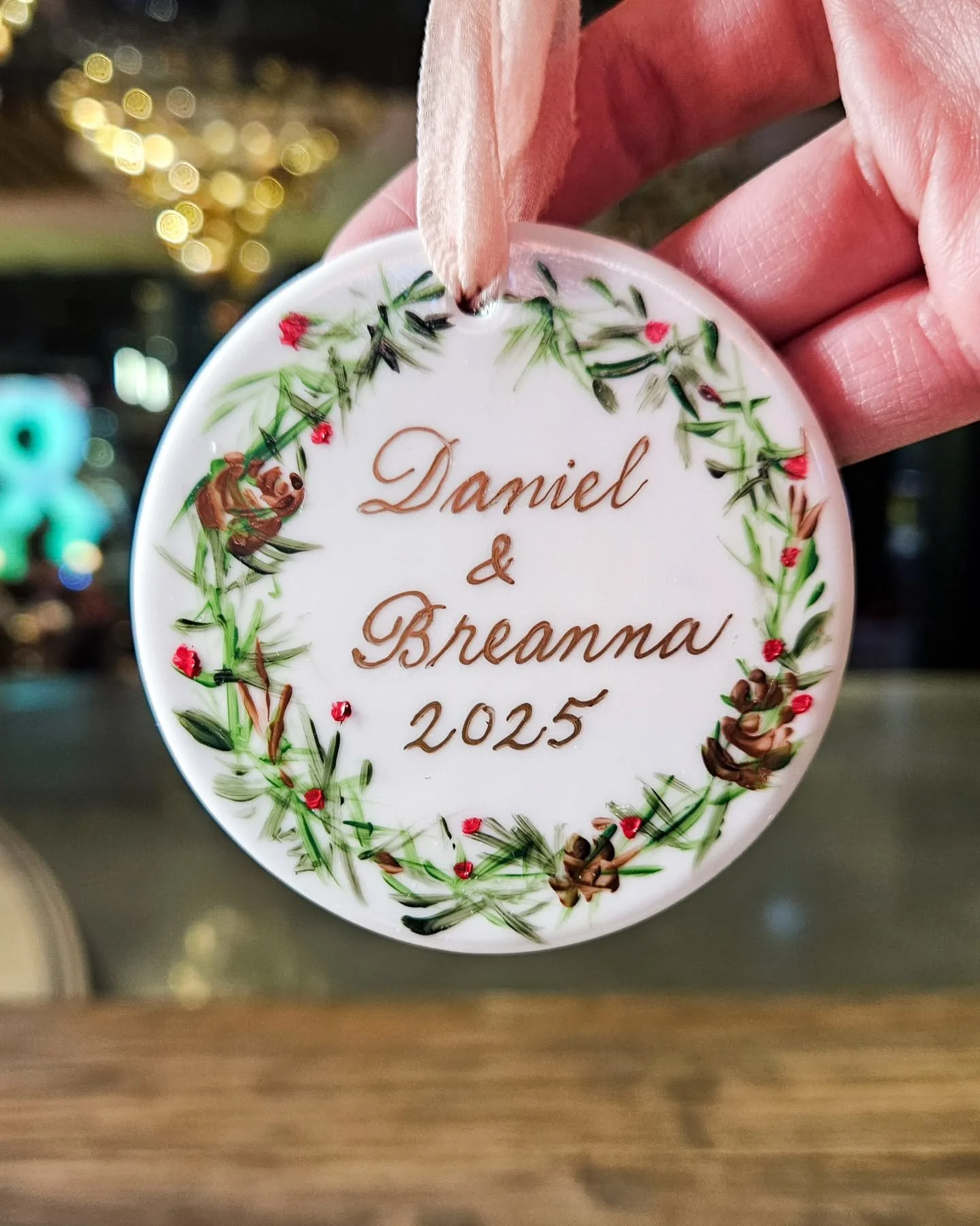 I had a recent corporate holiday event and surprised the guests with personalized ornaments. It was a labor of love but it was so worth it when they picked up their ornaments.

A lot of prep was needed to make it a smooth and seamless experience. Not