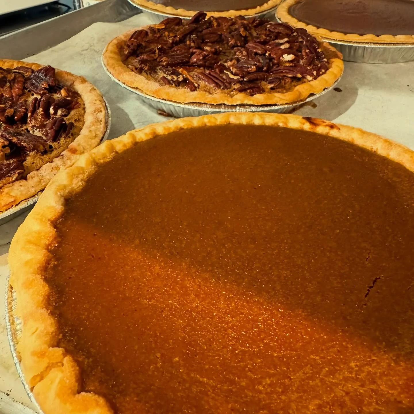 Pies on Pies on Pies! Which one is your favorite? 

Order for your Friendsgiving, Potlucks, Thanksgiving, family gatherings! 

*Pumpkin Pie
*Banana Cream
*Pecan
*Salted Honey
*Chocolate Hazelnut Bread Pudding Pie
*NEW Pumpkin Cheesecake
*Apple Crumbl