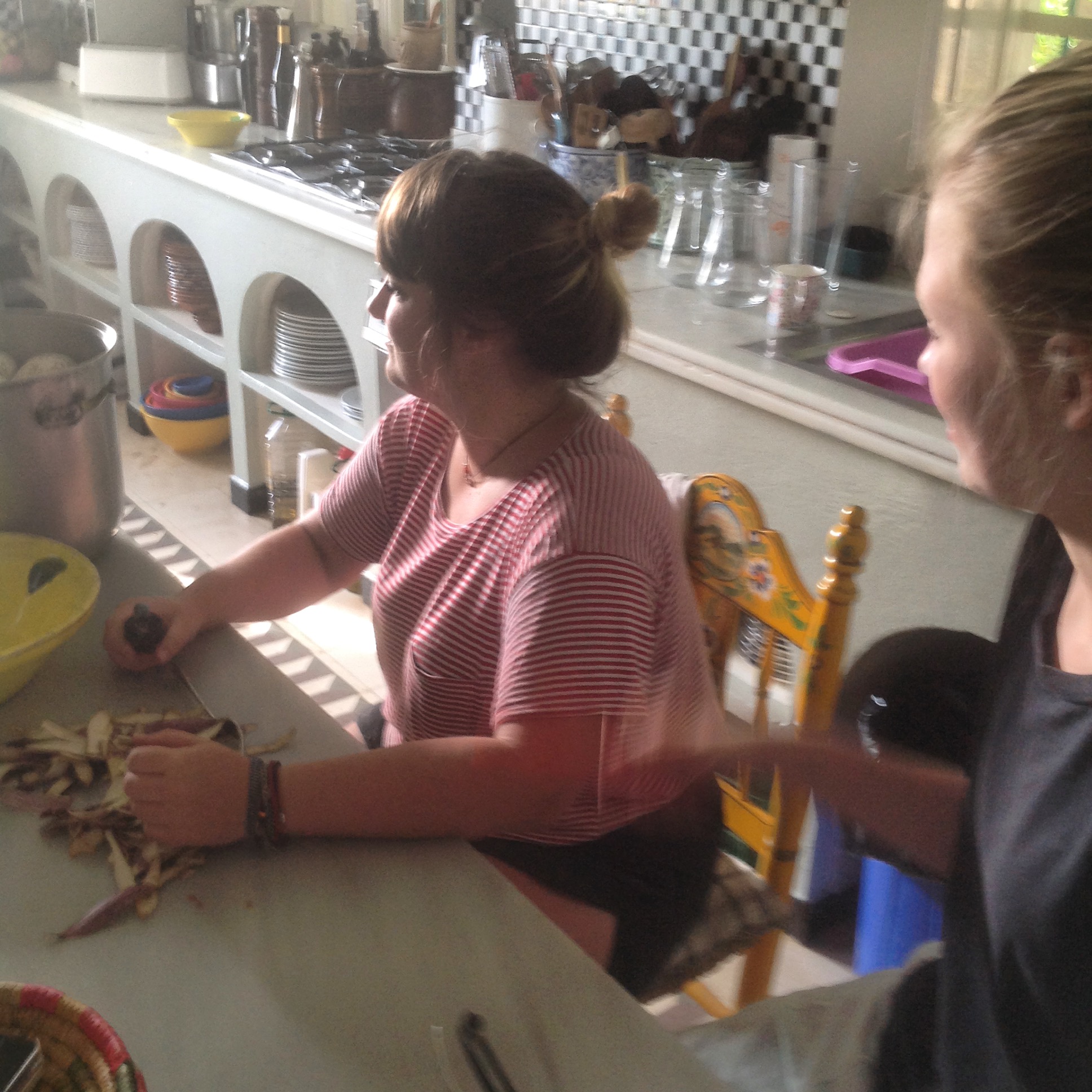 Lu Kingett and Claire Victory are helping to peel and prick. A couple of dozen were done in minutes and dropped into lemon acidulated water.