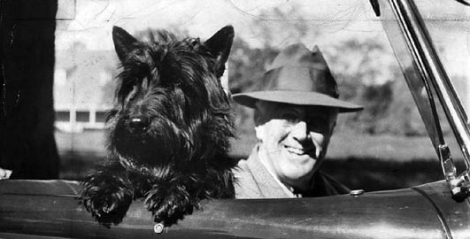 Franklin D. Roosevelt and Fala.