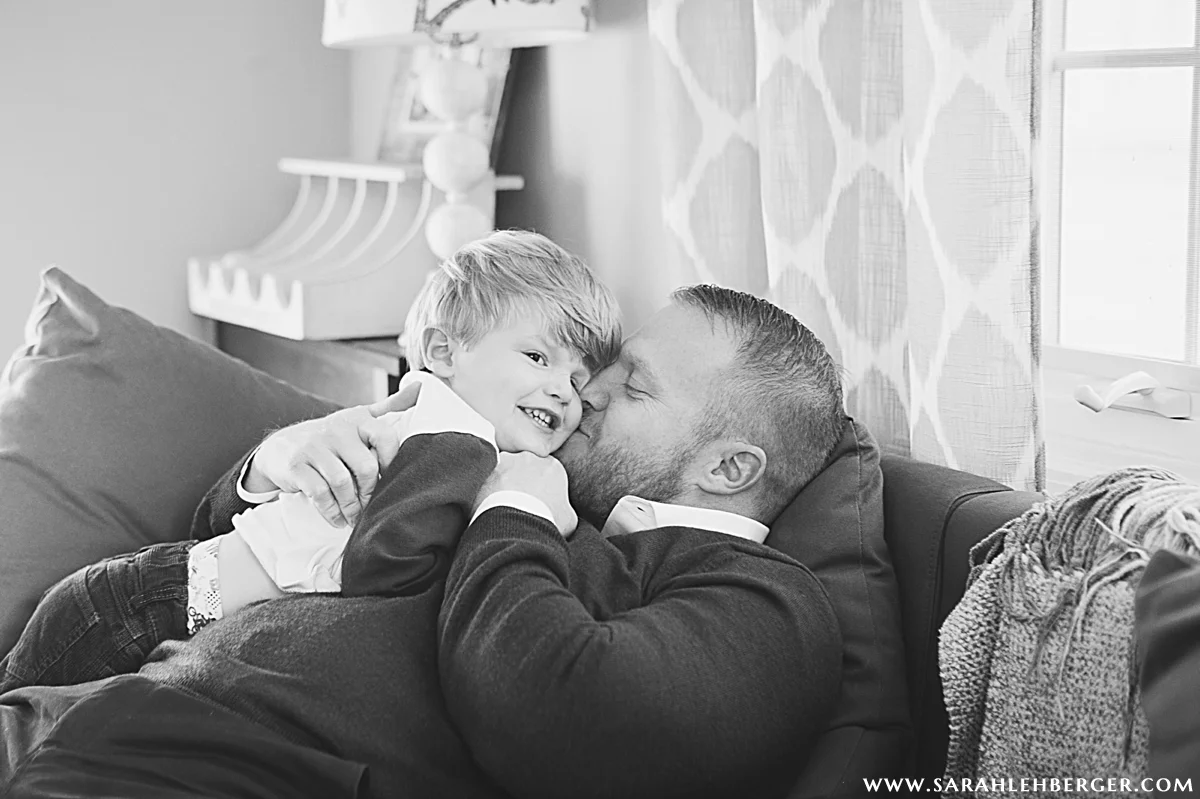 family-cuddles-snuggles-on-couch.jpg