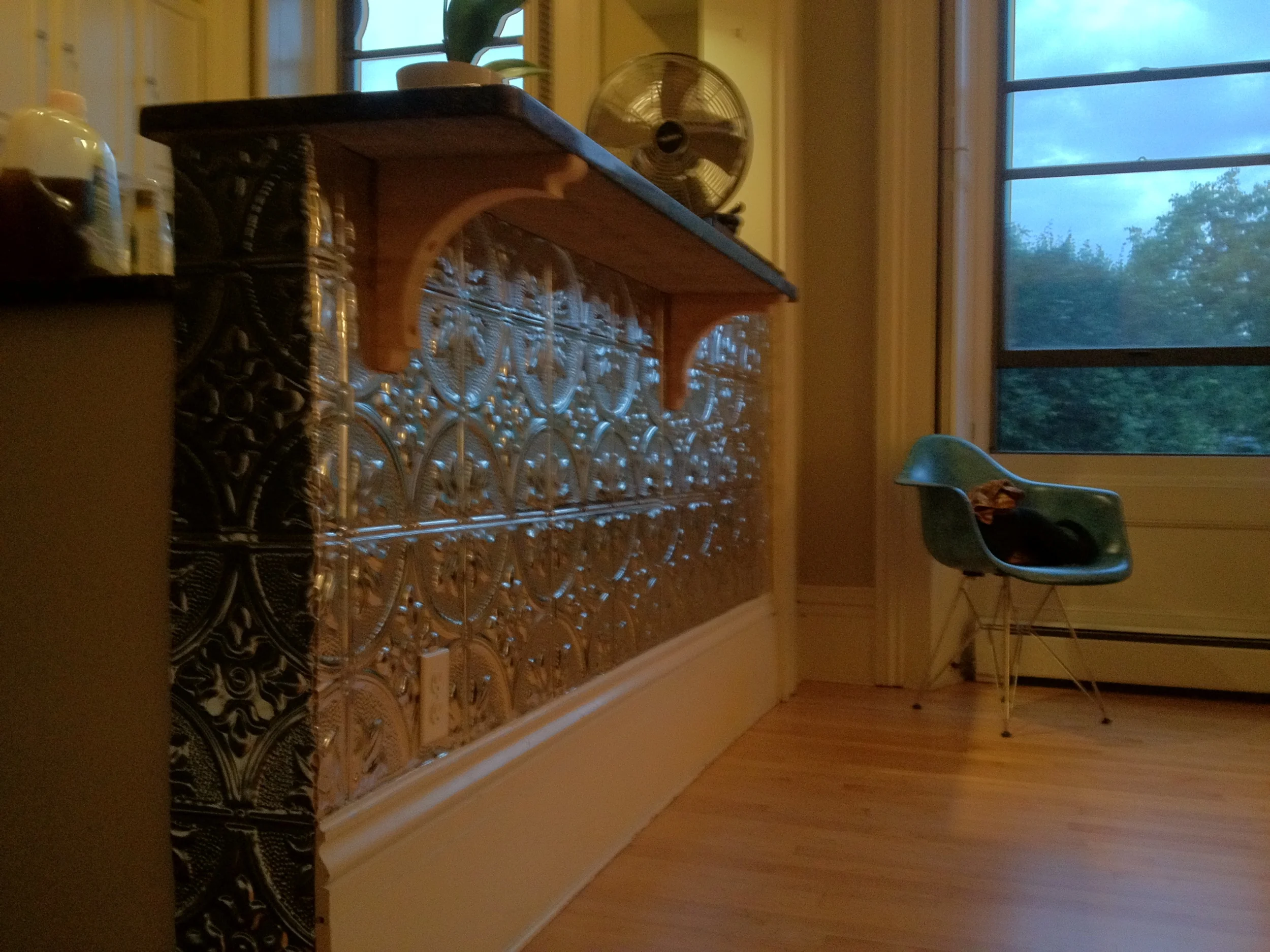 Tin tiles wrapped around a corner
