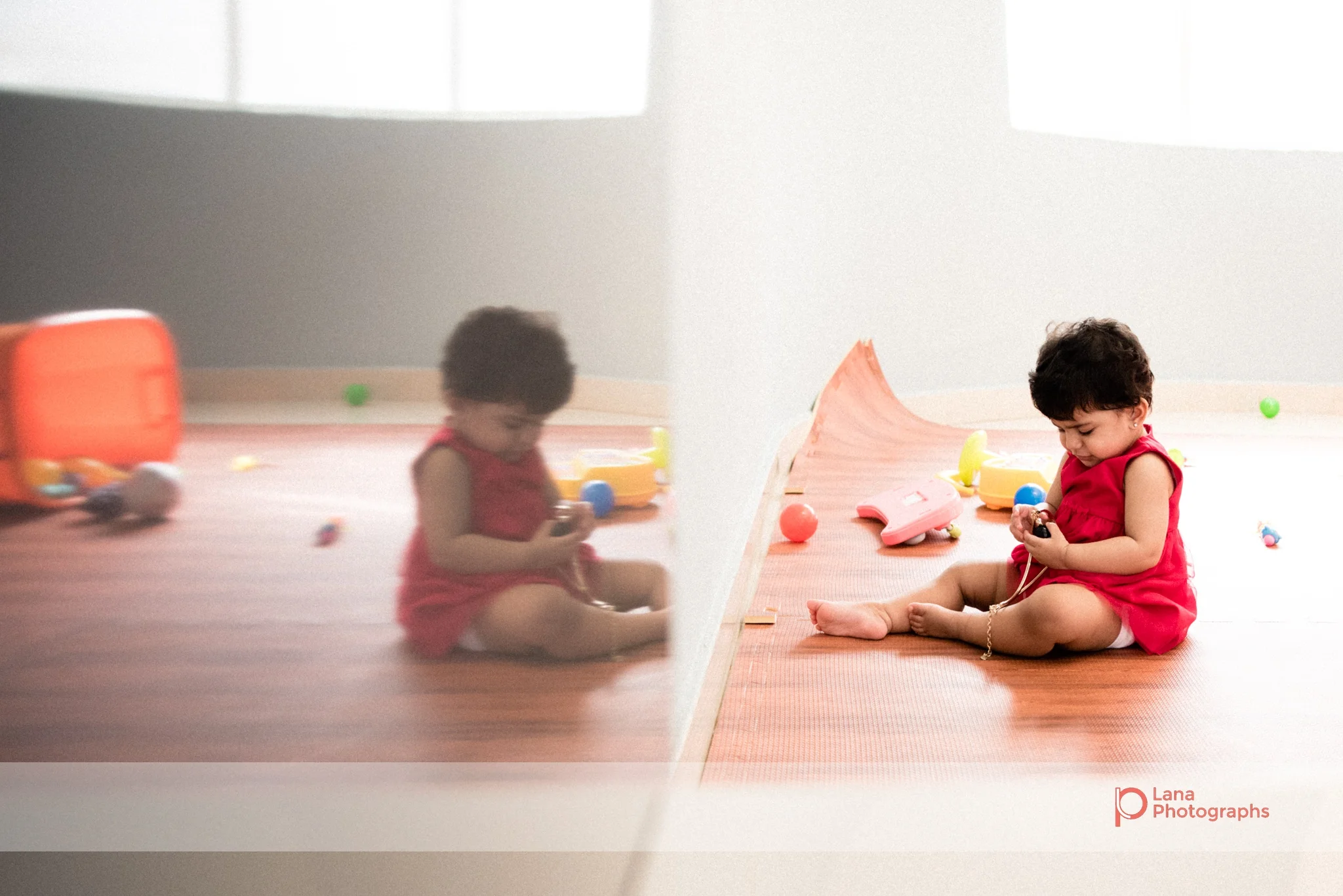 playing near a table showing a reflection of her birthday balloons reflection of girl playing with her toys
