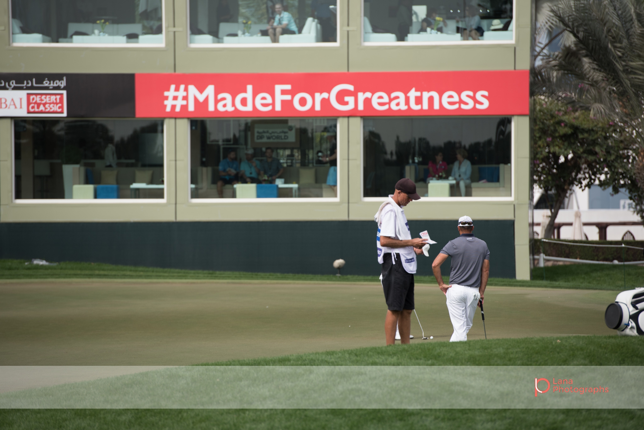   Grégory HAVRET &nbsp;stands in front of the #madeforgreatness sign at the Omega Dubai Desert Classic in February 2017 