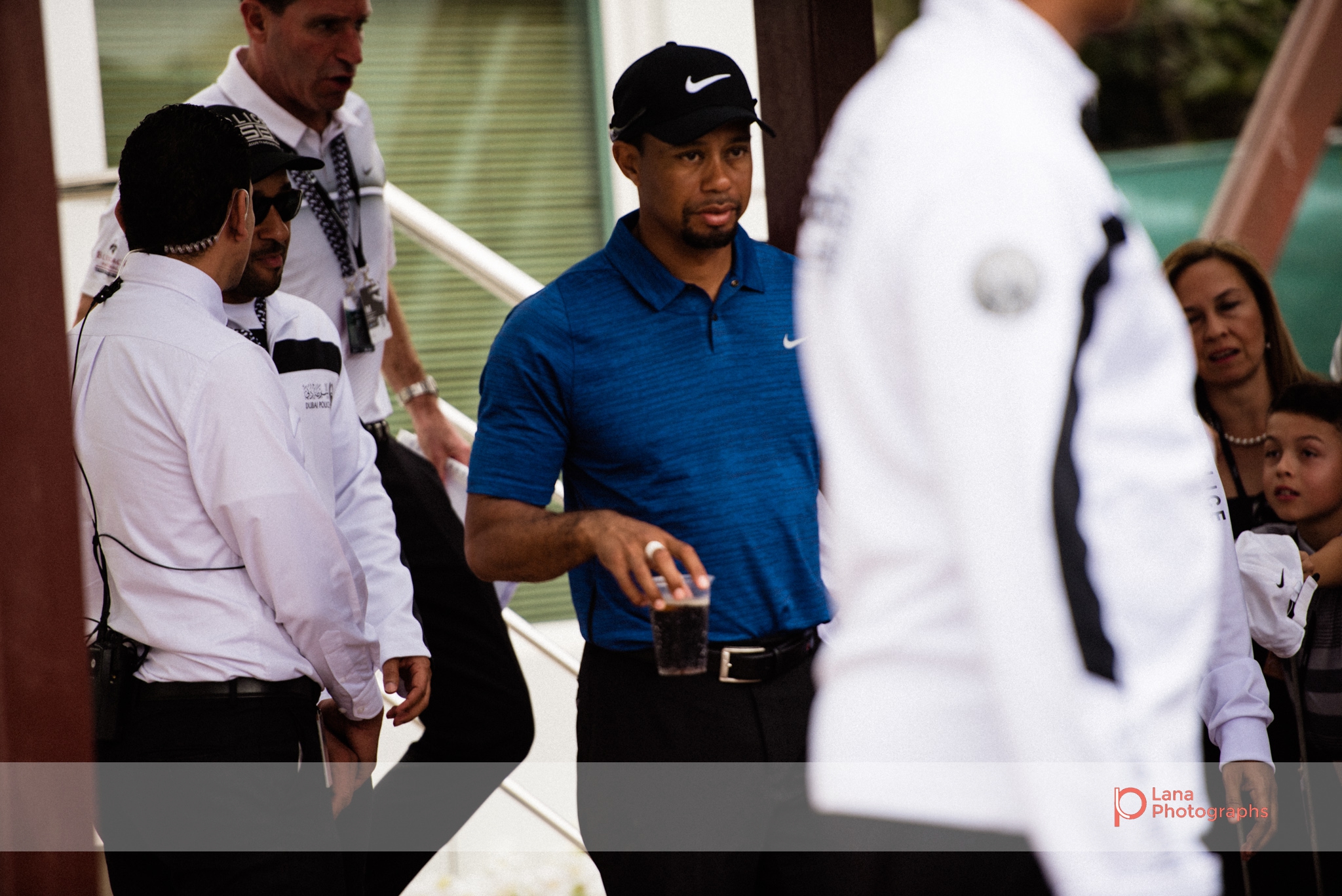 Tiger Woods leaves the organizers office and walks to his car during day 1 of the Omega Dubai Desert Classic in February 2017
