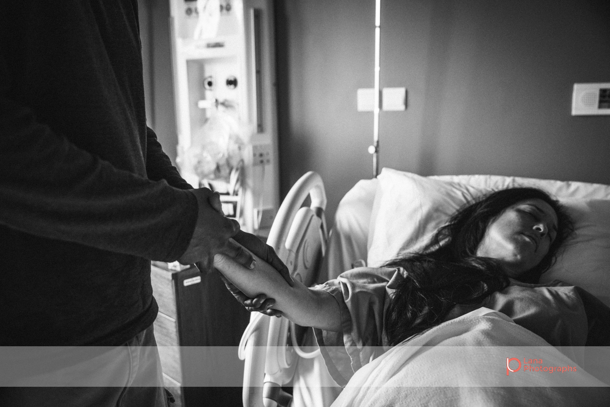 Lana Photographs Birth Photography Dubai Birth photographer dubai birth photography birth photography Mediclinic City Hospital father and mother holding hands