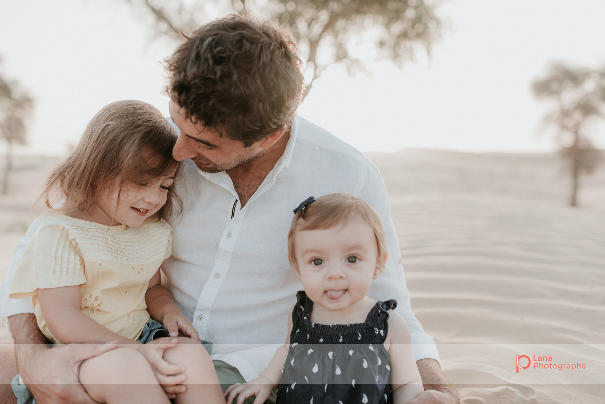  Lana Photographs Family Photographer Dubai Top Family Photographers father and his two daughters in the desert
