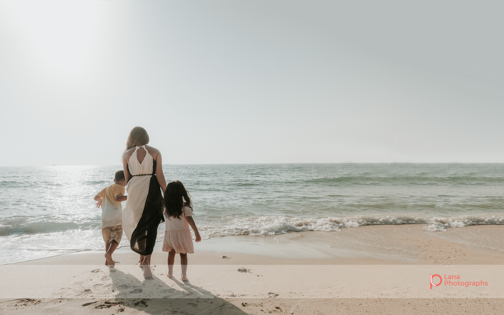 Lana Photographs Dubai Family Photography beach photoshoot family shot on the shore