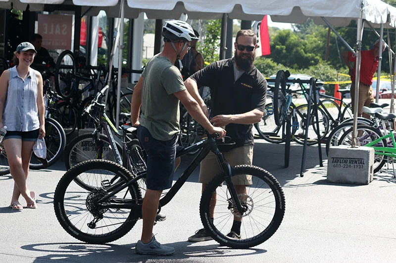 Rick helping out a customer at last weeks "Back To School" Bike Swap.
