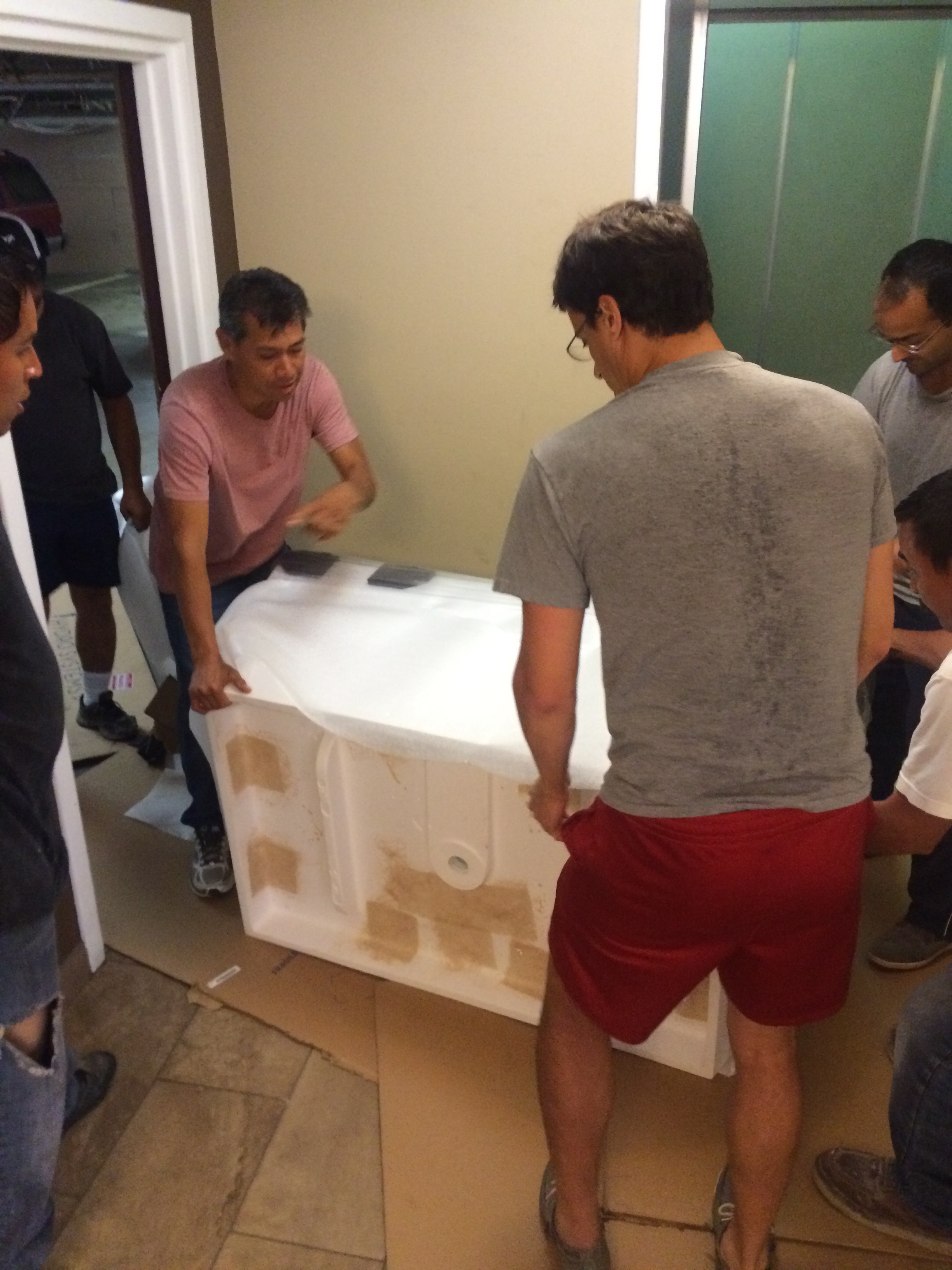 How many people does it take to get a 500 lb tub from the garage up to a second floor apartment? 8. It takes 8.