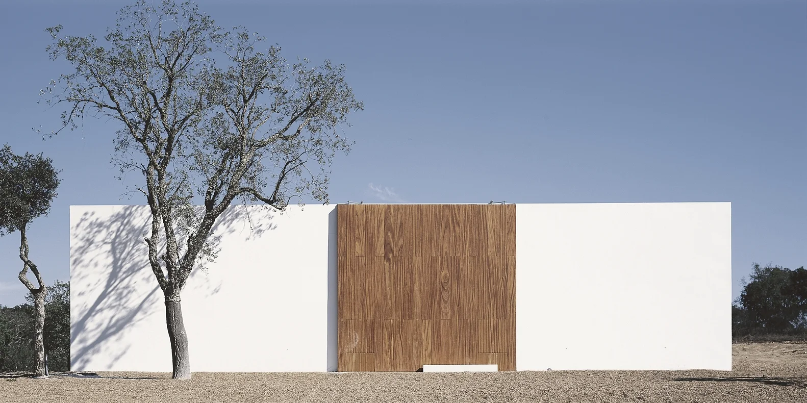 House in Litoral Alentejano by Aires Mateus. Photos copyrighted by Daniel Malhao. Courtesy of ArchDaily.