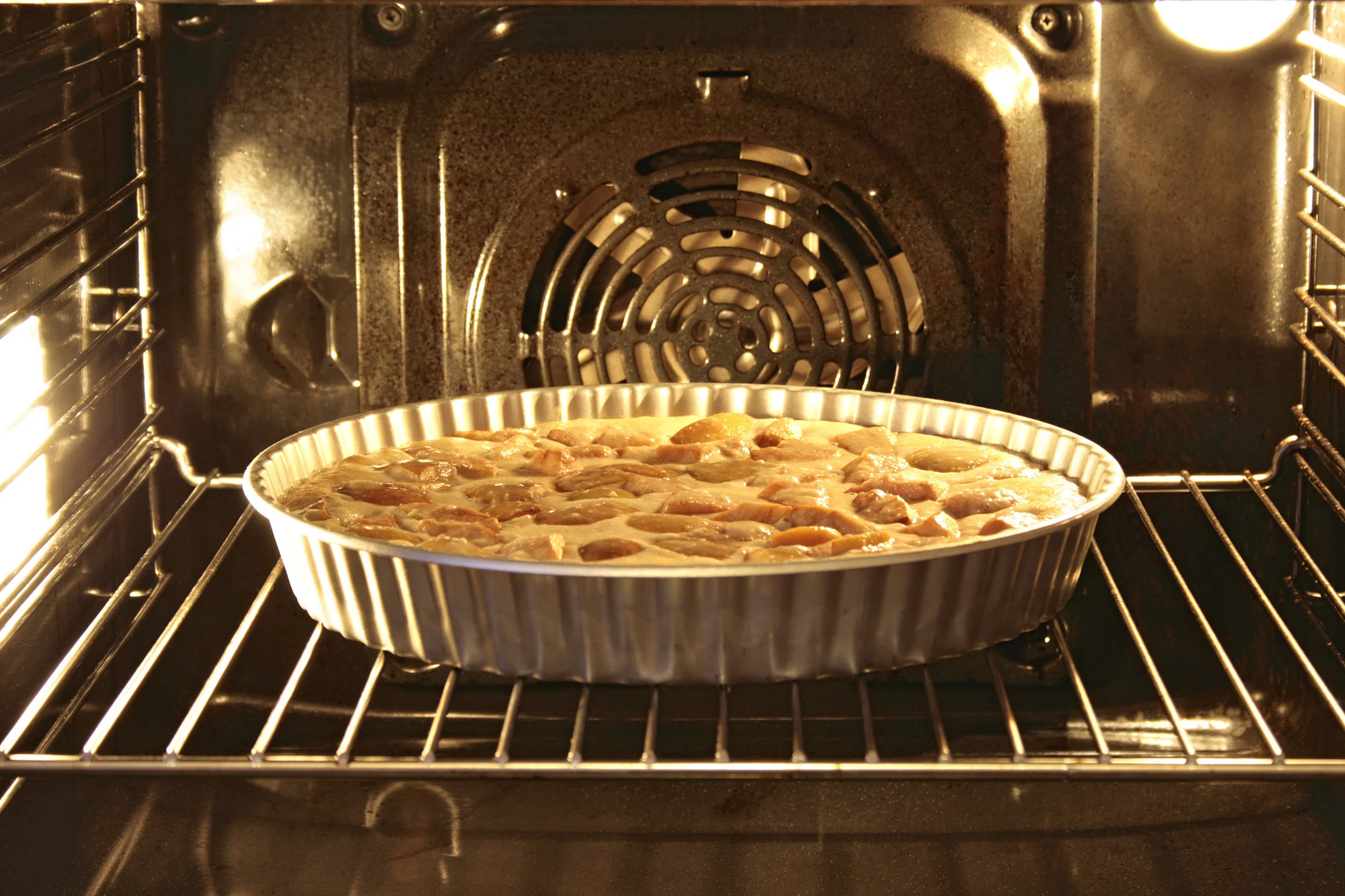 stock-photo-apple-pie-in-an-oven-30719215.jpg