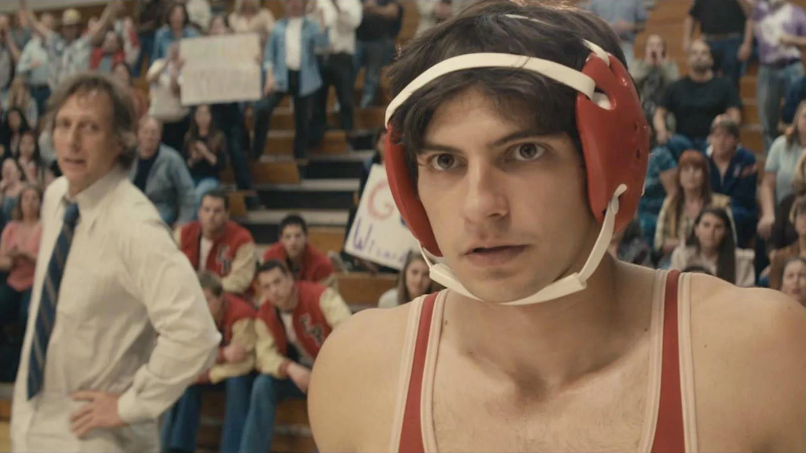 'American Wrestler' winningly combines sports drama with immigrant saga It might not add any fresh moves to the inspirational sports movie playbook, but the nicely crafted “American Wrestler: The Wizard,” about a teen who escapes from post-revolution Iran only to face hostile discrimination in Northern California circa 1980, possesses a potent timeliness