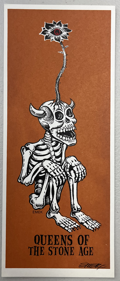 QOTSA orange crouching skull.png