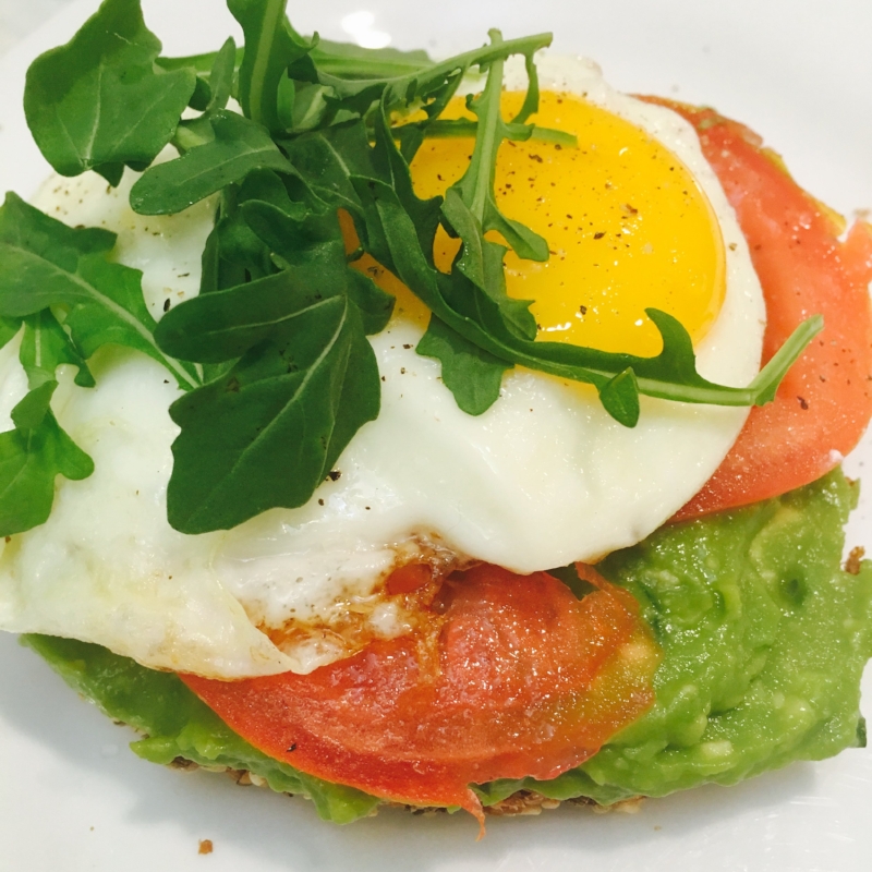 Image description: avocado toast, i.e. mashed avocado (I added fresh rosemary!) on super hippie sprouted grain bread, topped with tomato slices, a fried egg, and a little bit of arugula. Sugar free is actually pretty "sweet".