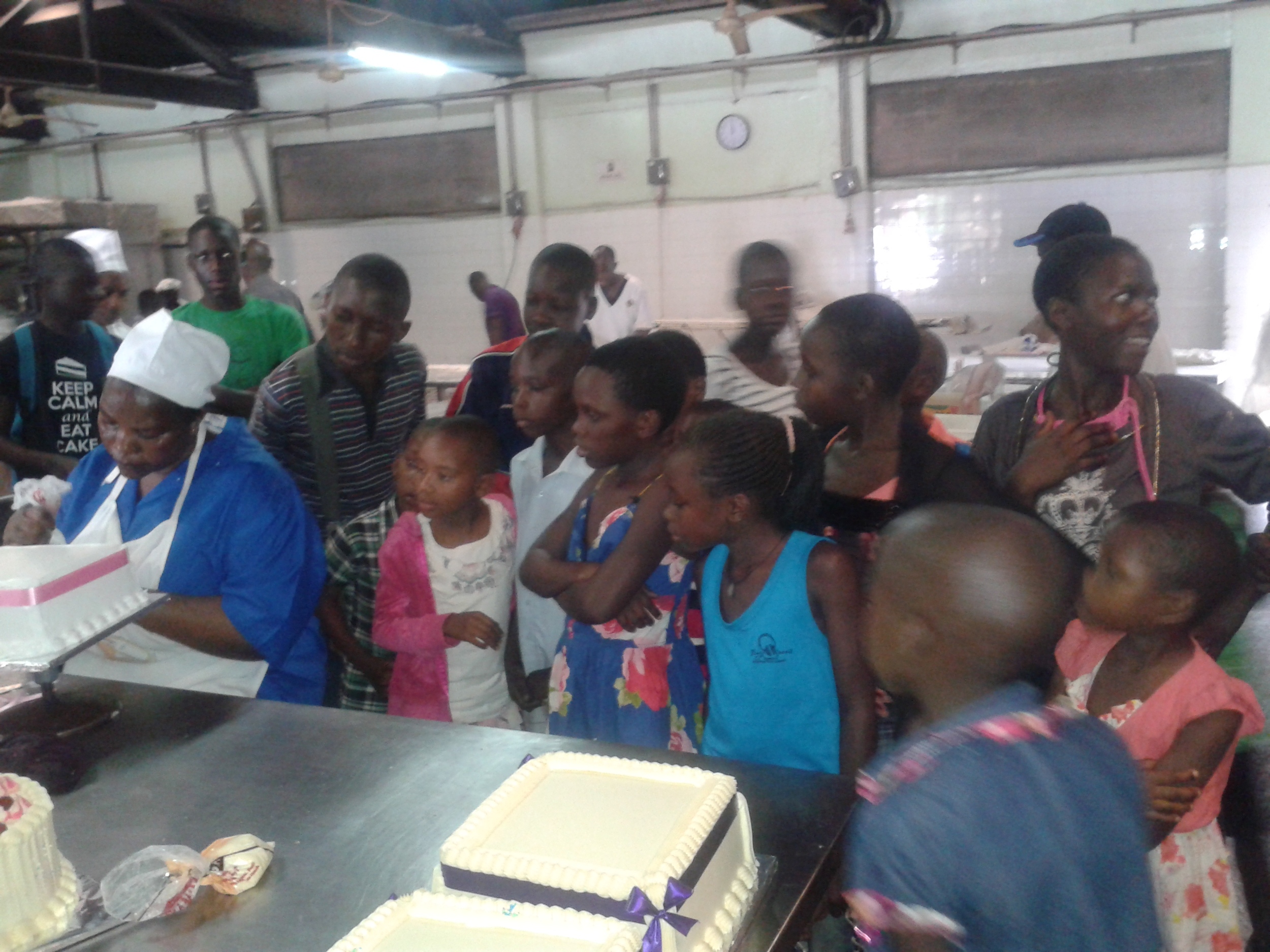 Uganda children visiting bakery.jpg