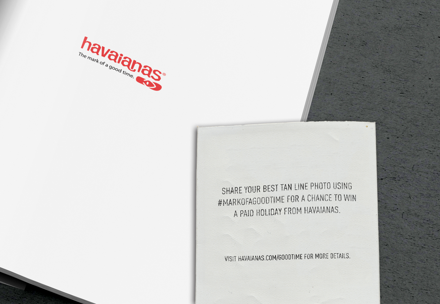 — and the back of the Polaroid engages the reader.