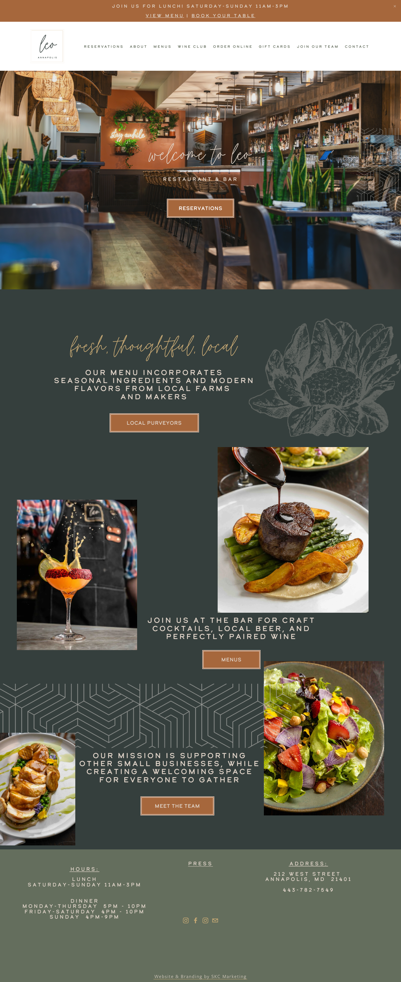 A restaurant website homepage featuring an interior shot of a bar with tables, chairs, and shelves stocked with bottles. The page promotes local ingredients, craft cocktails, and a welcoming space, with images of food and drinks.