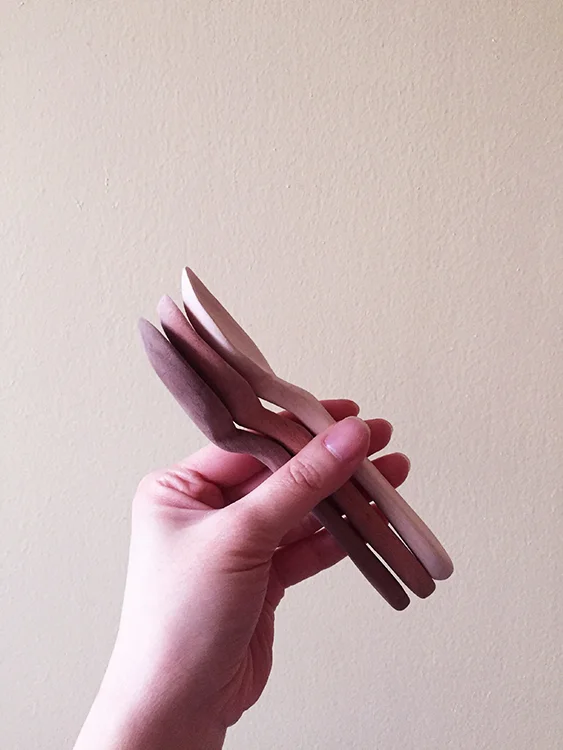  eating spoons in walnut, mahogany, and maple 
