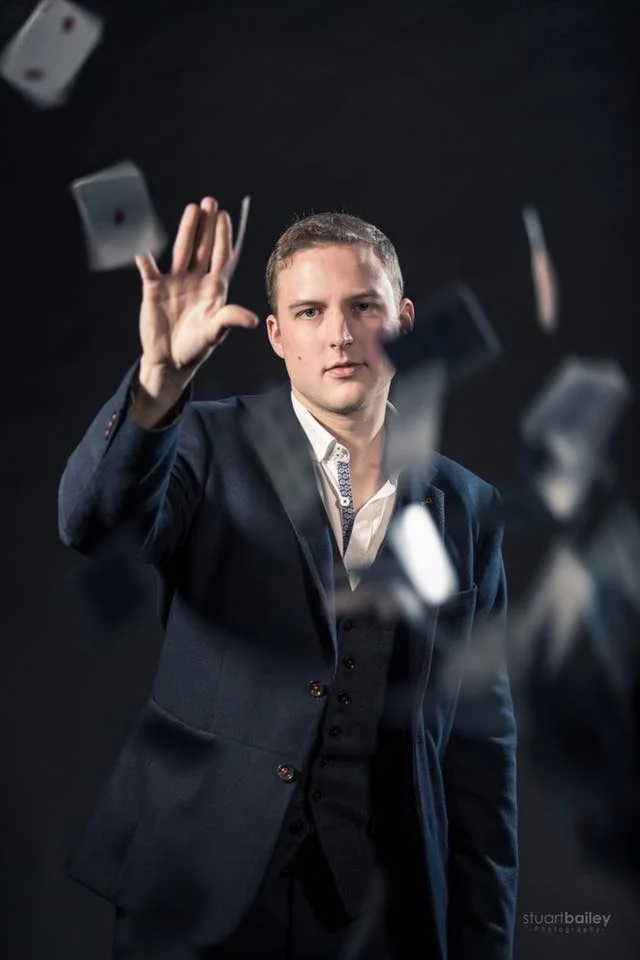 Iain Bailey London Wedding Magician plays 52 card pick up