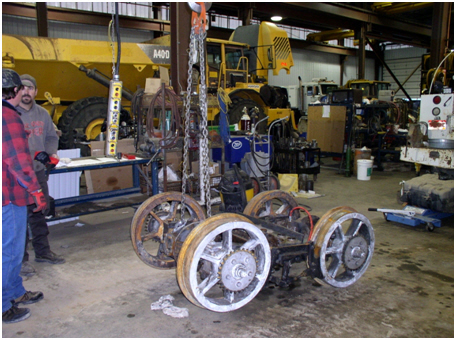 In December, 2008 the main drive truck (wheel set) was removed from the Goose and sent to Skanska Construction’s shop (near Cortez, Colorado) for a complete overhaul. Here you see it as it was delivered to their shop.
