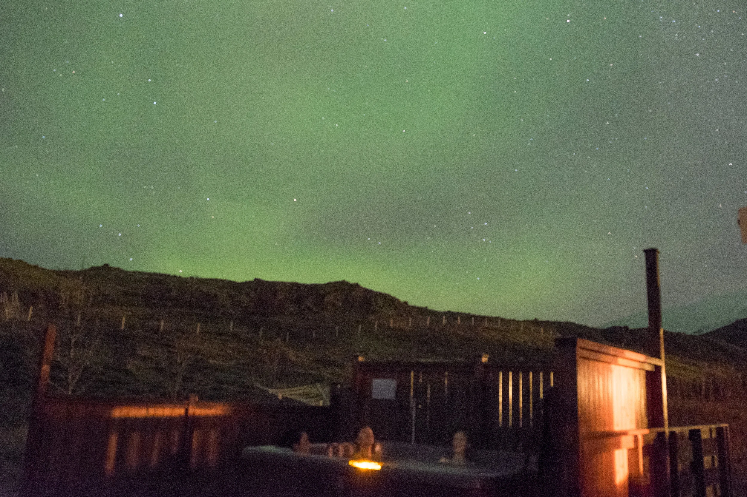  We spent part of our nights soaking in hot tub sharing our hearts and dreams. When the Northern Lights came to accompany us, we jumped maniacally for a 'short' 20 minutes. It was truly magical.&nbsp;@kympham #icelandxwildlight 