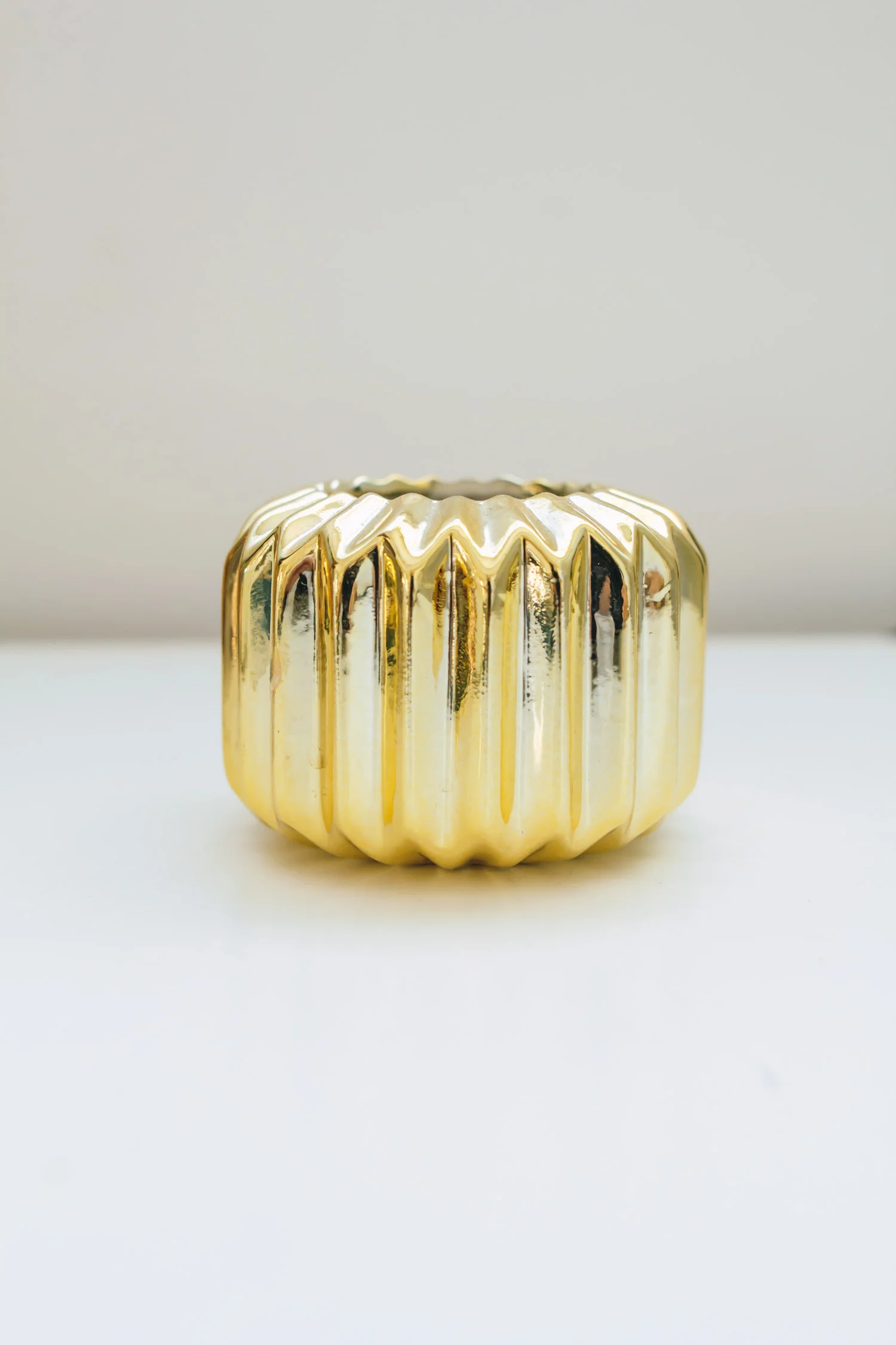 AVIDEAS INVENTORY VOTIVES VESSLES Small Gold Porcelain Votive.jpg