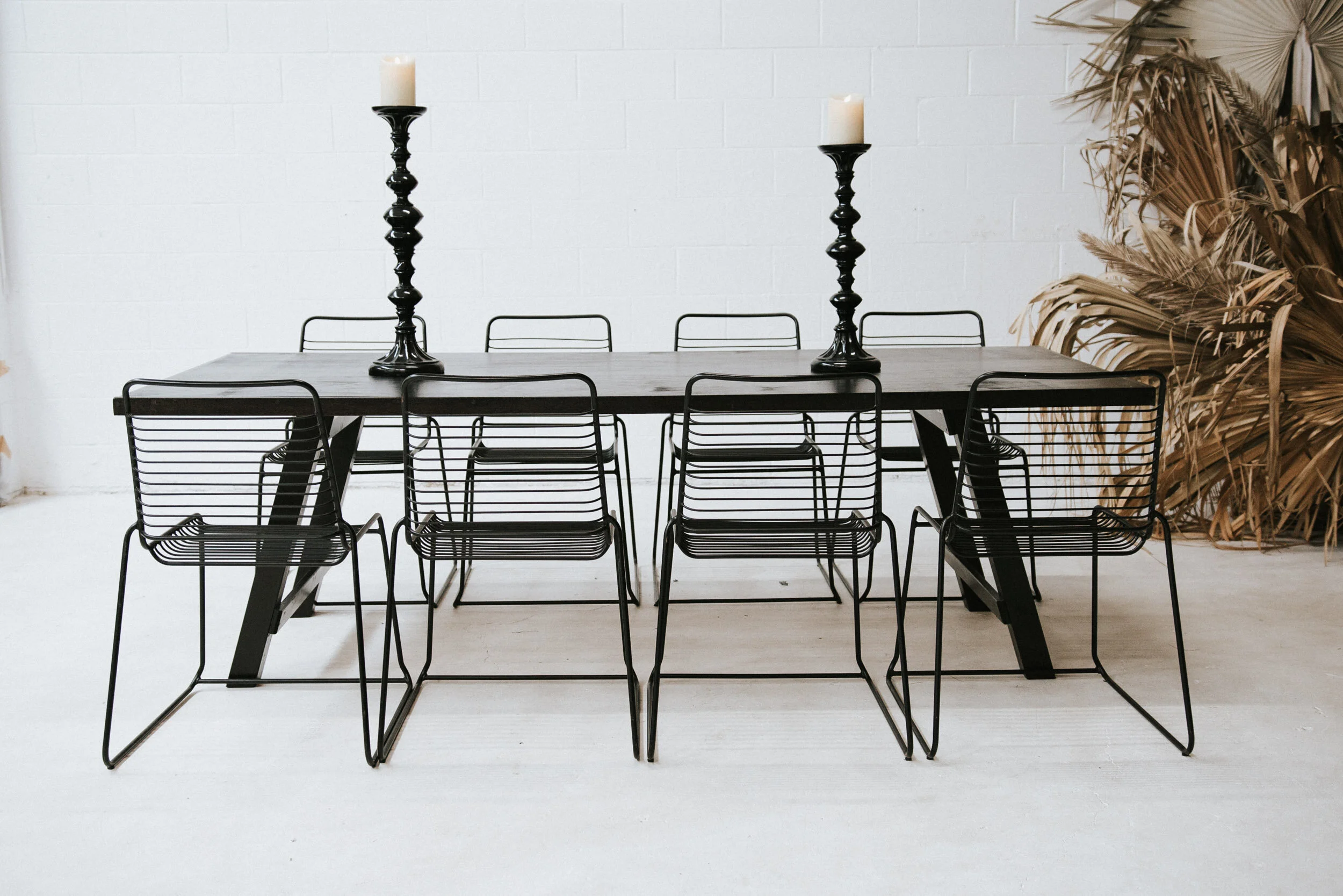 BLACK TIMBER BANQUET TABLE BLACK WIRE CHAIRS.JPG