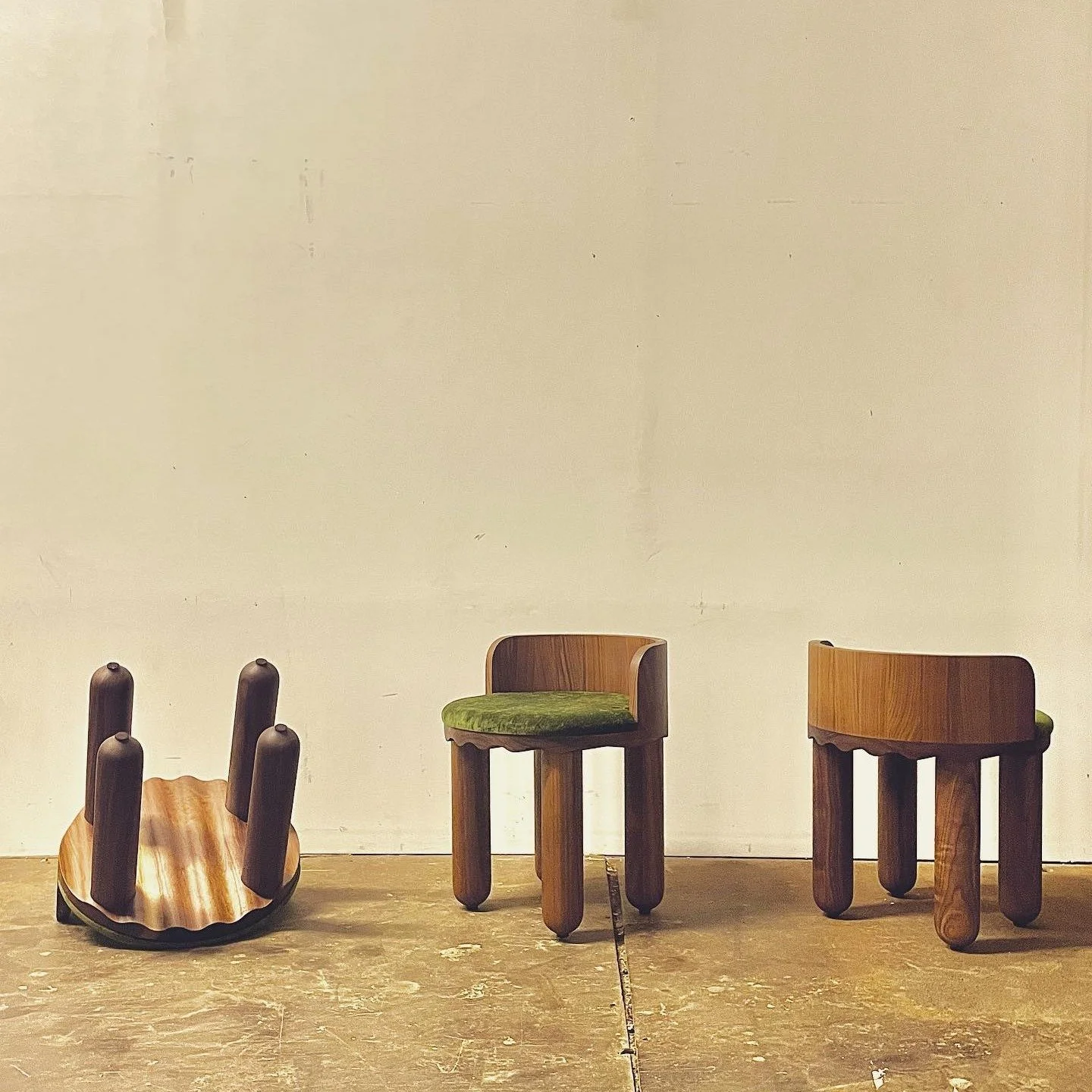 Another multi-angle view of our popular 𝐍𝐀𝐌𝐈 𝐃𝐢𝐧𝐢𝐧𝐠 𝐂𝐡𝐚𝐢𝐫𝐬, featured in Walnut with green Velvet&hellip; 
 
Don&rsquo;t be fooled by the study construction; the playful and comfortable seats allow for extended periods around the dinne