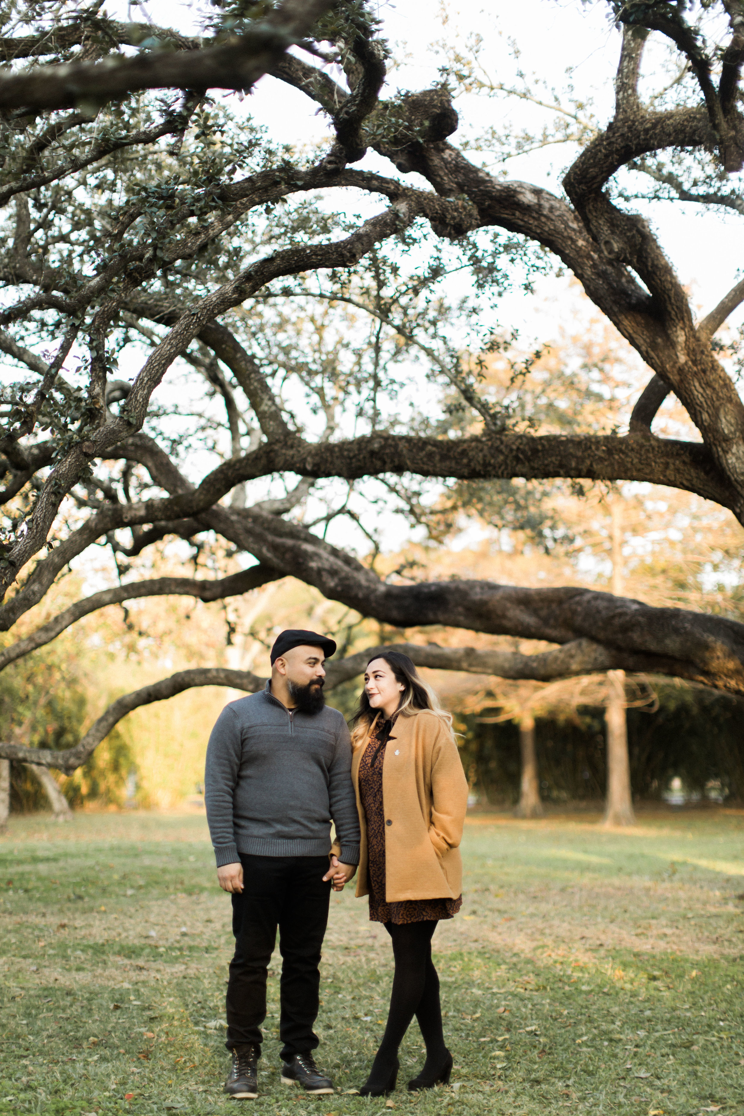 I am excited to be sharing a few of my favorite photograph from Michelle and Ricardo's engagement session. This was defiantly a tough day for all of us, probably the coldest day of the year thus far. These two cuties defiantly stuck it out and did such an amazing job in front of the camera. Michelle and Ricardo decided that they wanted their engagement session to take place at the Rothko Chapel and the Menil grounds. They mentioned that this place was very special to them, since much of the beginning of their relationship took place at these very locations. We had such a great time laughing, walking around and making memories. We can not wait to be able to document their love on their big day! Here are a few special images. Enjoy!