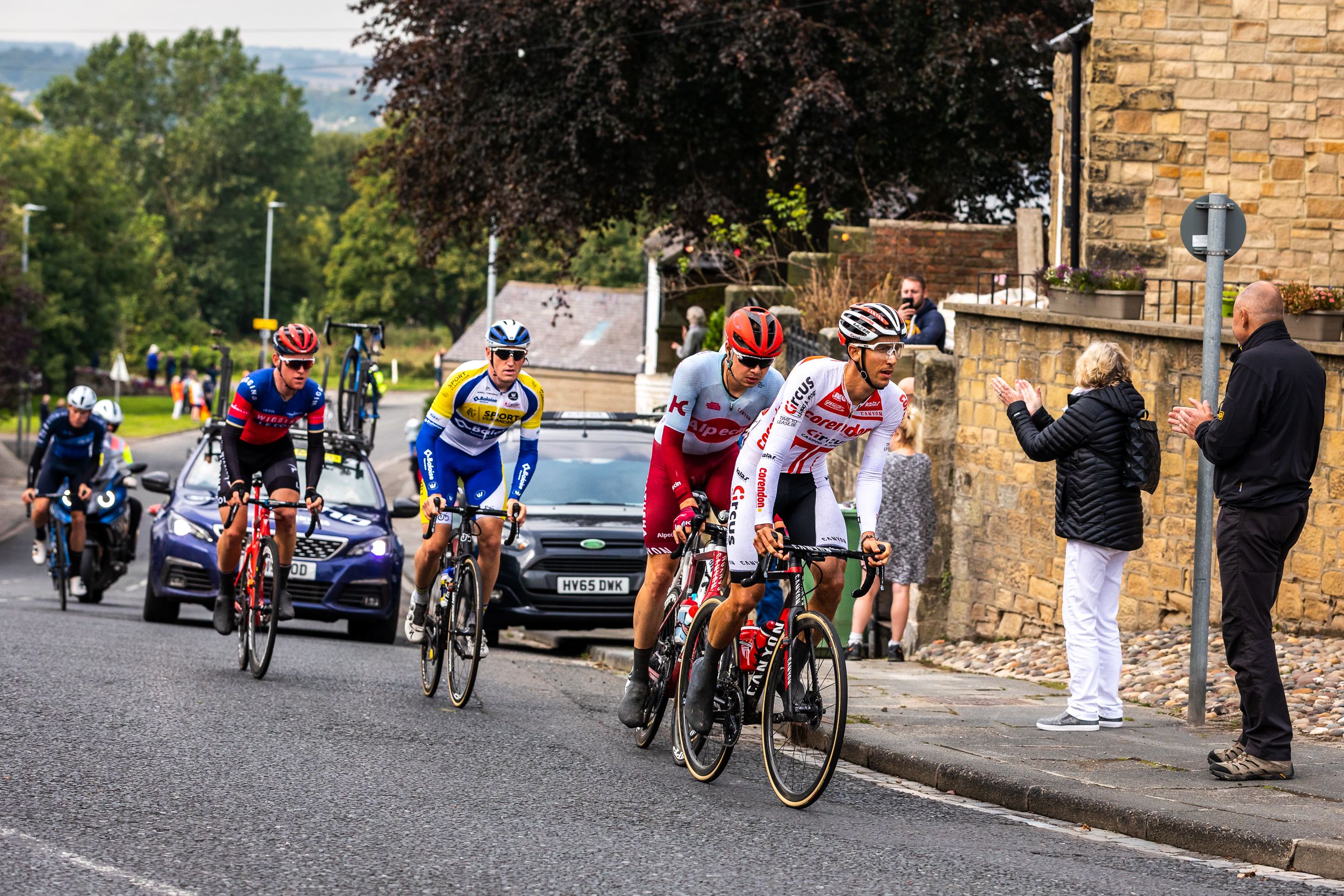 The breakaway approaches the top of The Wynd, Amble.
