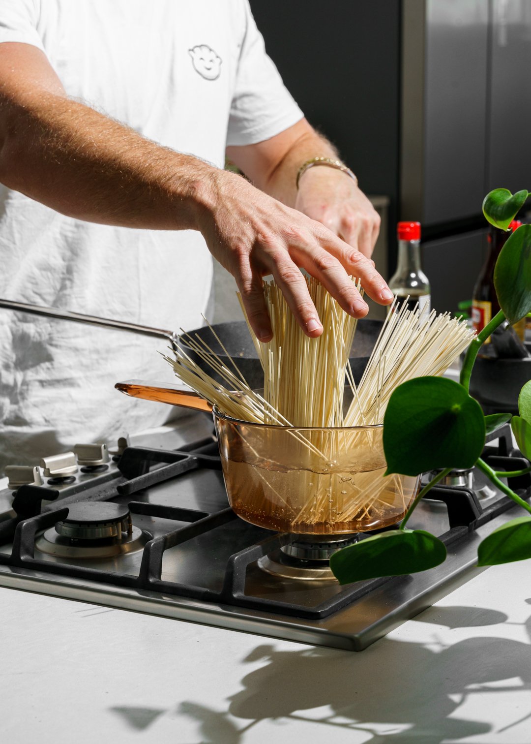 Hayden Quinn cooking Dan Dan Noodles