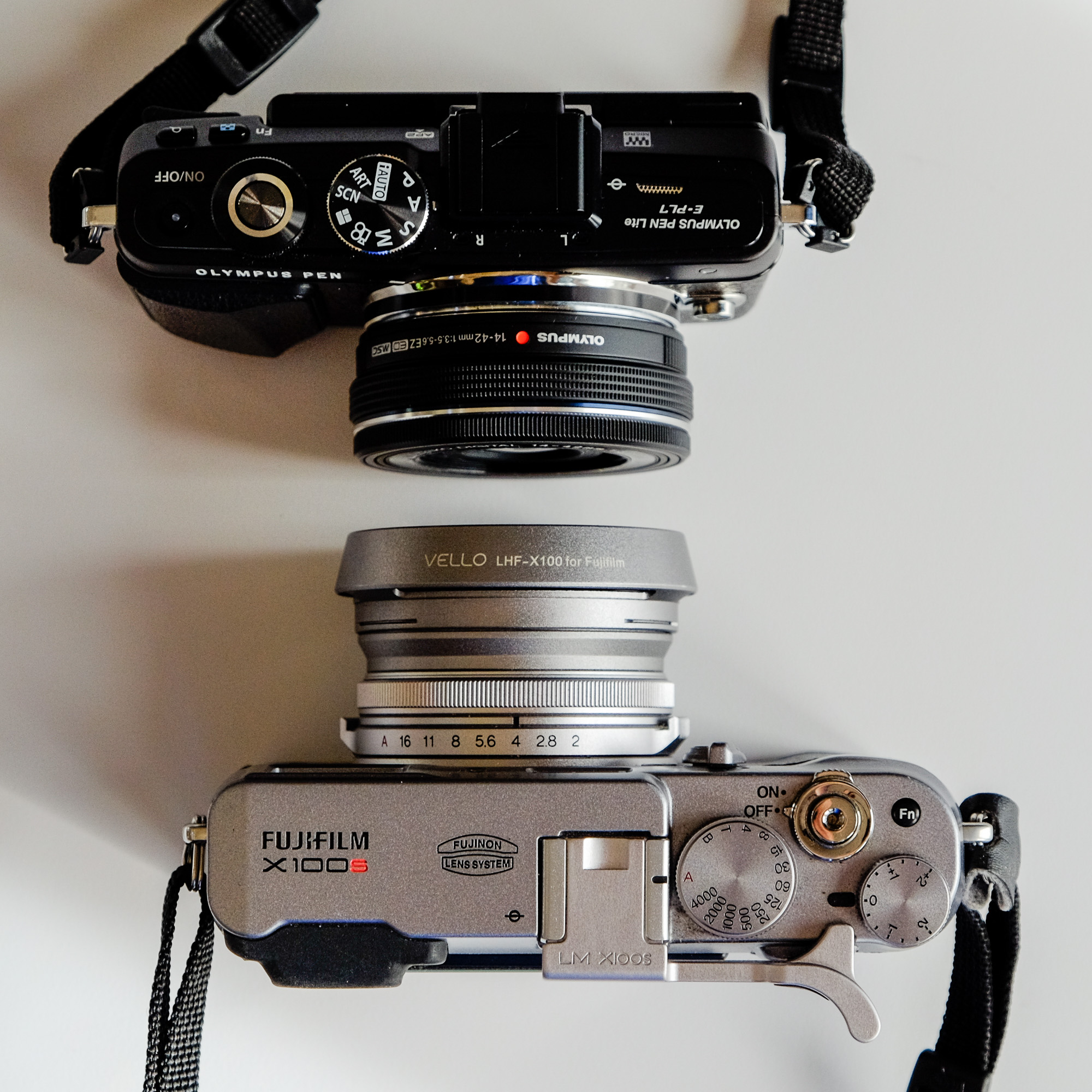 I've got a hood permanently on my X100S which increases its thickness