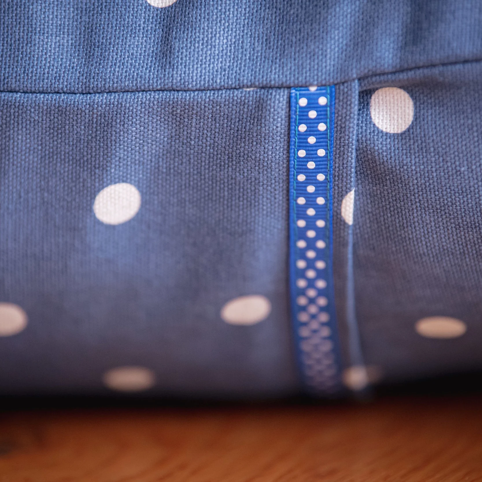 Throw cushion detail in Denim Blue L spot fabric