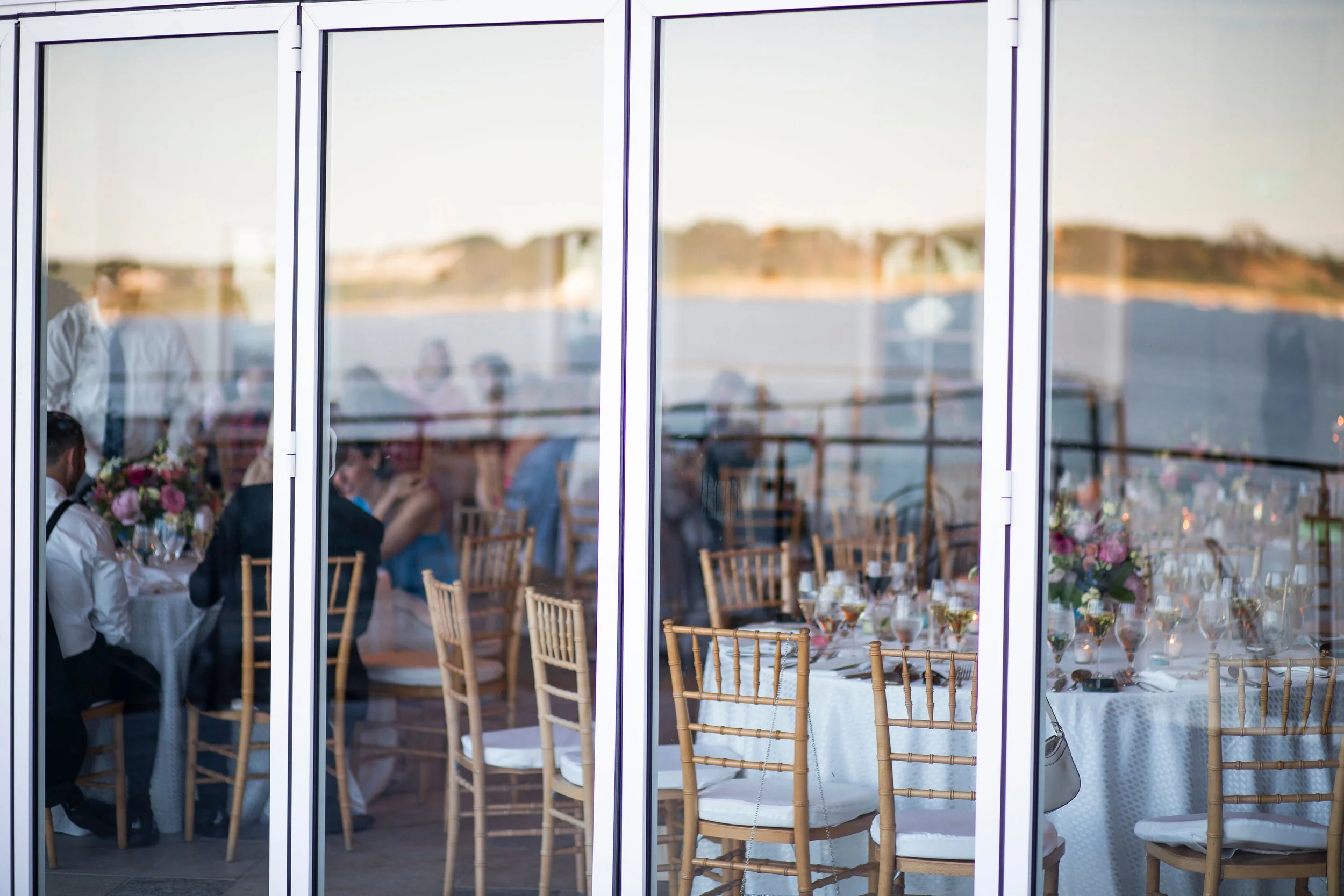cape cod wedding wequassett wedding window reflection of harbor