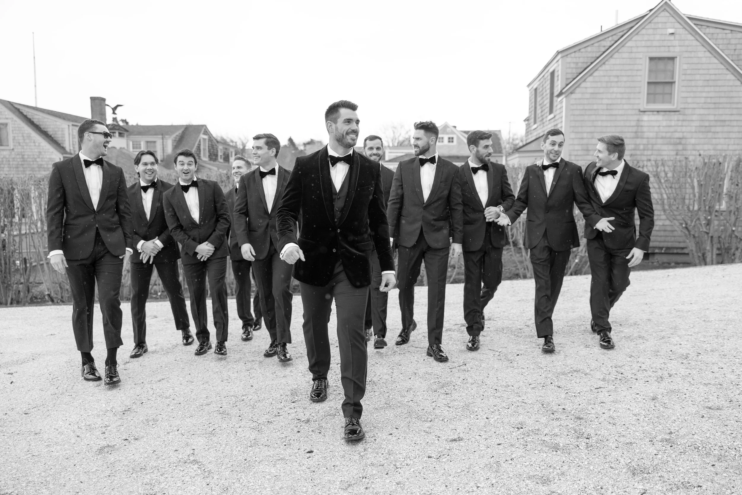 cape cod wedding at chatham bars inn groomsmen flying v black and white photo.jpg